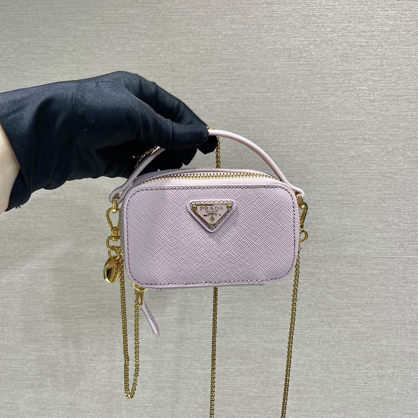 Pra*a top handle bags
